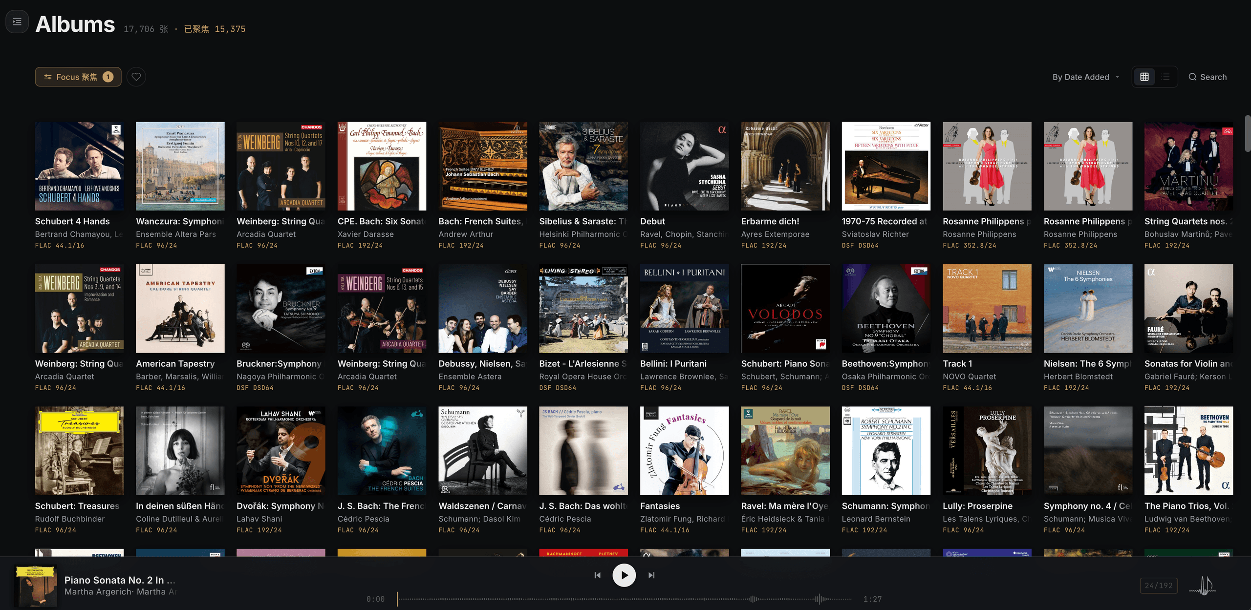 PureAlbum Albums grid view showing 17,706 albums, cover art columns, navigation, and the bottom playback bar